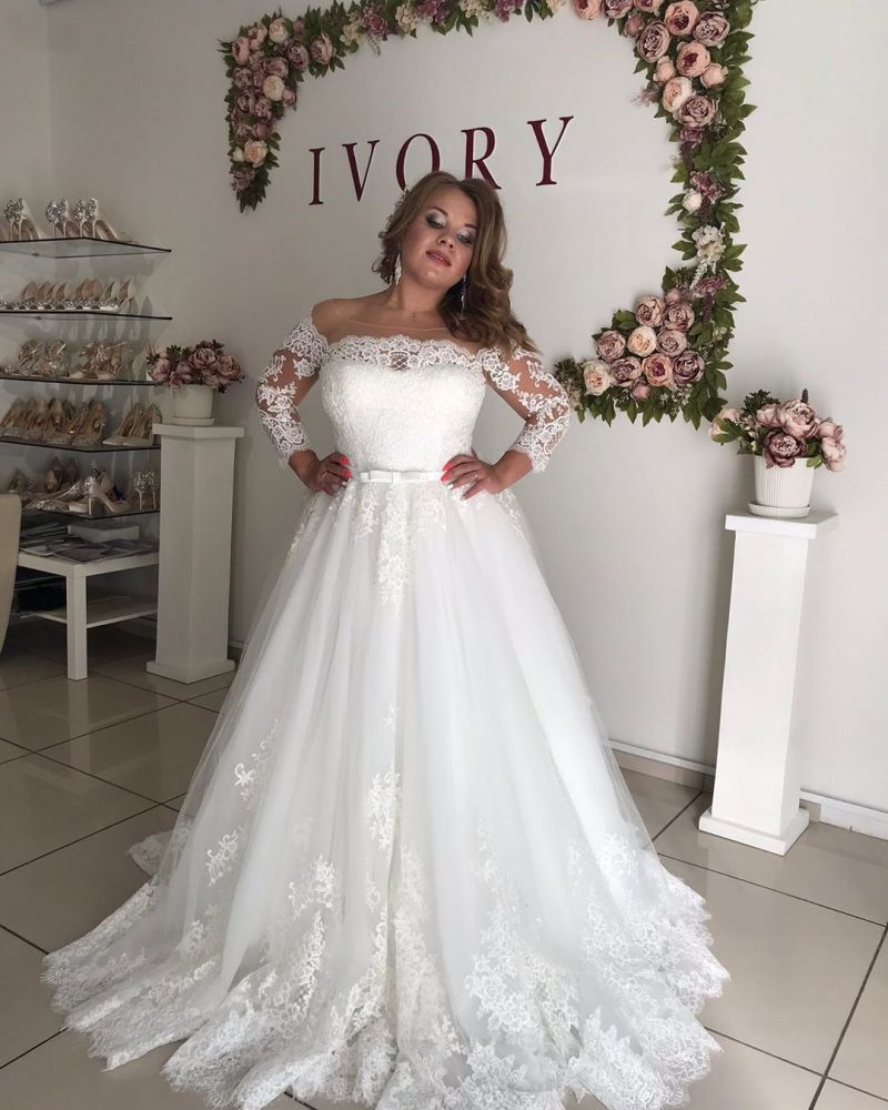 stylesnuggle offers Amazing Off-the-Shoulder Long Sleevess Lace Princess Plus size wedding dress at factory price from White,Ivory,Champagne,Black, Lace to A-line Floor-length hem.