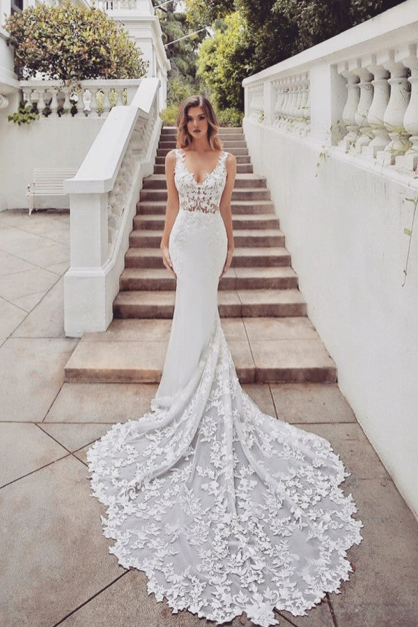 Searching for a dress in lace, Mermaid style, and delicate Lace,Pearls work? We meet all your need with this Classic AmazingTrain Sleeveless V-neck Lace mermaid wedding dresses at factory price.