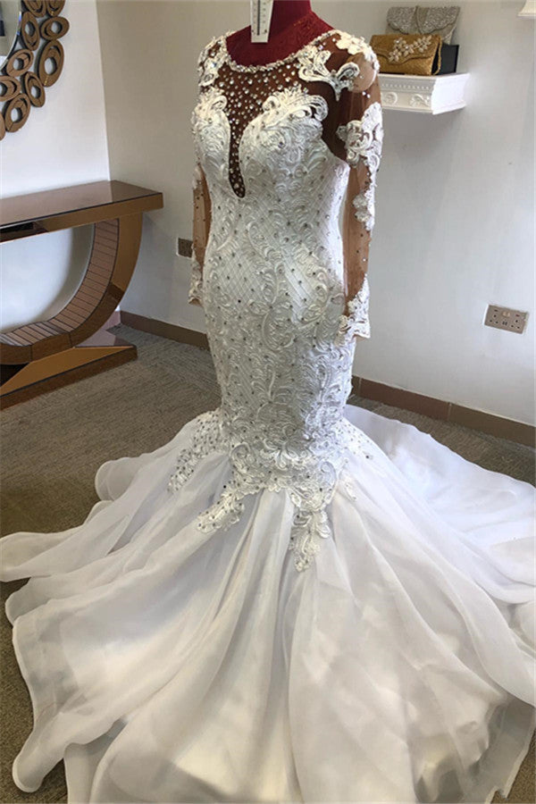 Inspired by this mermaid wedding dress at stylesnuggle.com, we meet all your needs with this Classic Beading Mermaid Sheer Tulle Wedding Dress.