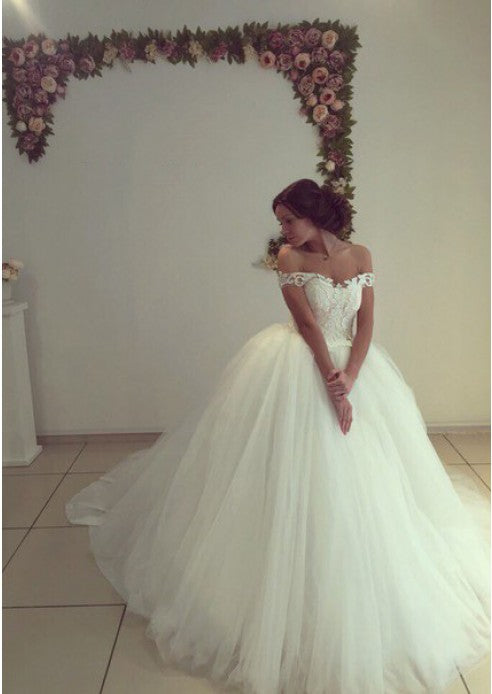 This Off-the-Shoulder Tulle Ball Gown Wedding Dresses at stylesnuggle.com will make your guests say wow. The Sweetheart bodice is thoughtfully lined, and the Floor-length skirt with Lace,Cascading Ruffles to provide the airy.