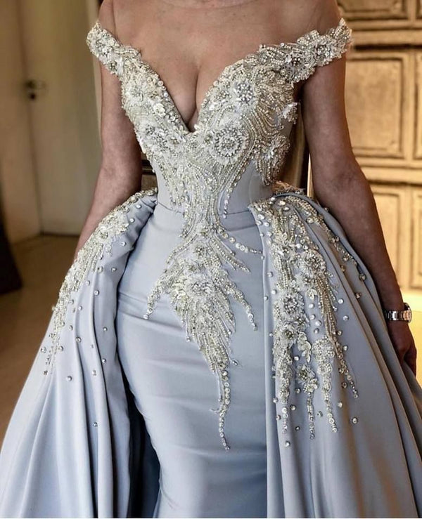 stylesnuggle offers new Elegant Off-the-Shoulder V-neck Mermaid Beading Appliques Prom Dresses With Overskirt Blue Sleeveless Long Party Gowns at cheap prices. It is a gorgeous Column Prom Dresses in Satin,  which meets all your requirement.