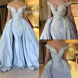 stylesnuggle offers new Elegant Off-the-Shoulder V-neck Mermaid Beading Appliques Prom Dresses With Overskirt Blue Sleeveless Long Party Gowns at cheap prices. It is a gorgeous Column Prom Dresses in Satin,  which meets all your requirement.