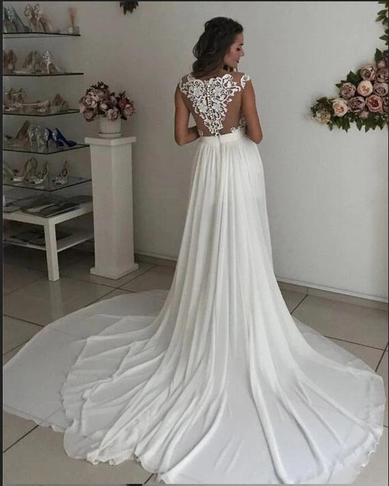 stylesnuggle offers Cap sleeves V-neck Chiffon Front split Court Train Wedding Dress at factory price.High quality promised, fast delivery worldwide.