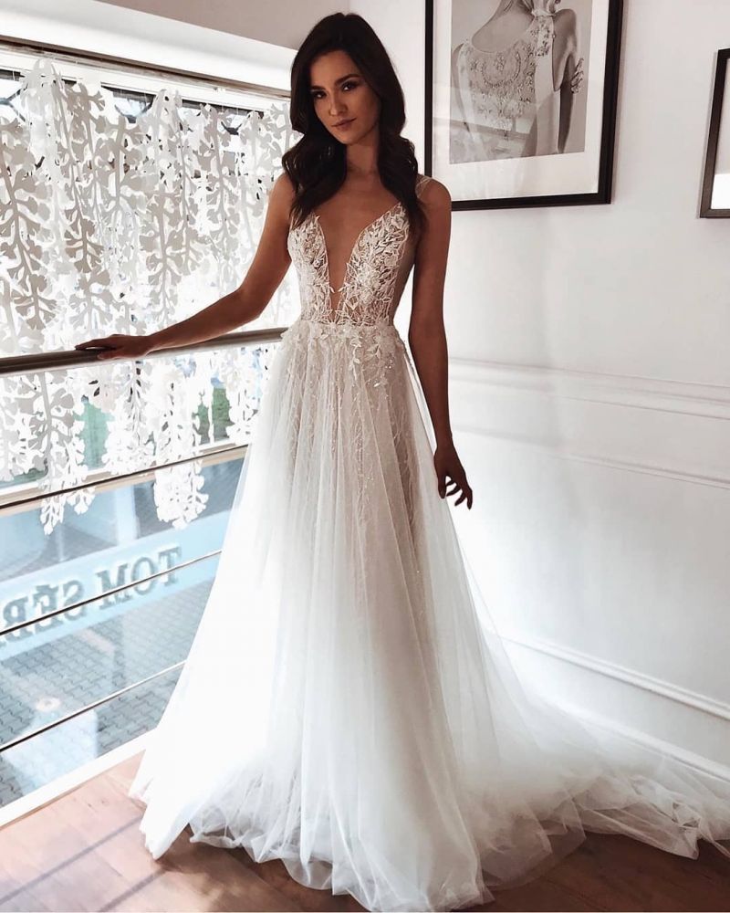 stylesnuggle offers Chic Tulle A-line Ivory Lace V-neck Summer Beach Wedding Dress at factory price from White,Ivory,Champagne,Black, Tulle,Lace to A-line hem. All sold at reasonable price