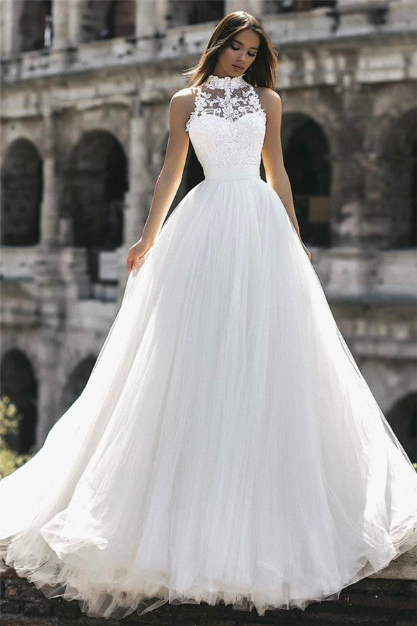 Check this Classic High Neck Sleeveless Appliques A-Line Floor-Length Wedding Dresses at stylesnuggle.com, this dress will make your guests say wow. The High Neck bodice is thoughtfully lined, and the Floor-length skirt with Appliques to provide the airy, flatter look of Lace.