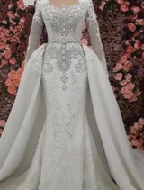 Any idea of dress for your big day? stylesnuggle custom made you this Classic Long Sleevess Mermaid Wedding Dresses with Overskirt at factory price.