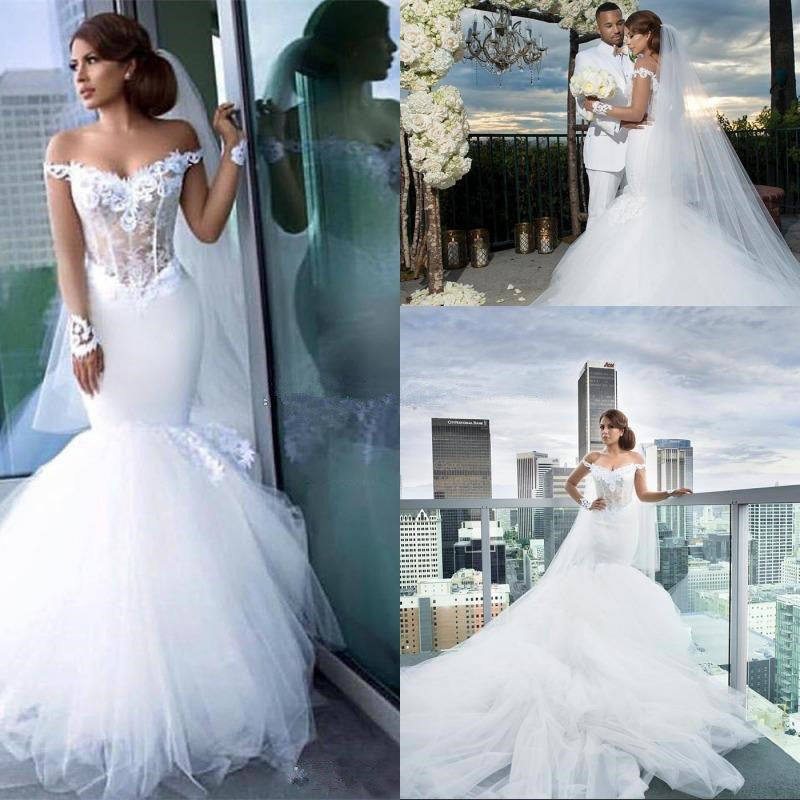 stylesnuggle offers Classic Off-the-Shoulder Tulle Mermaid Appliques Long-Sleeves Wedding Dress at factory price ,all made in high quality,fast delivery worldwide.