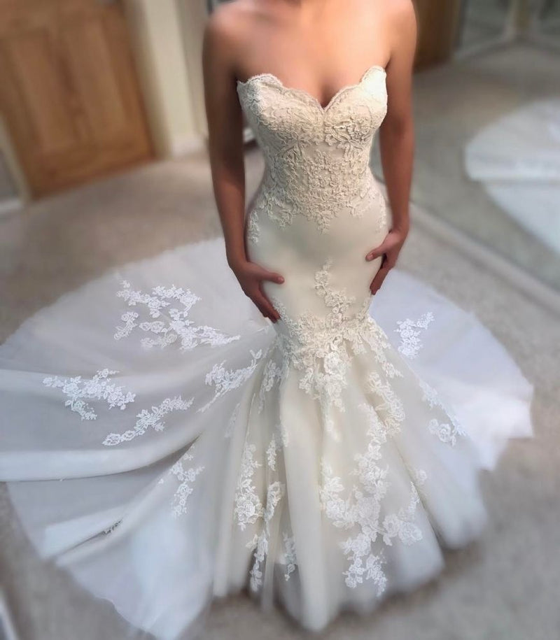 Check out this spring/autumn sleeveless lace appliques mermaid ivory wedding at stylesnuggle. Fast Shipping worldwide, custom made, all sizes and colors.