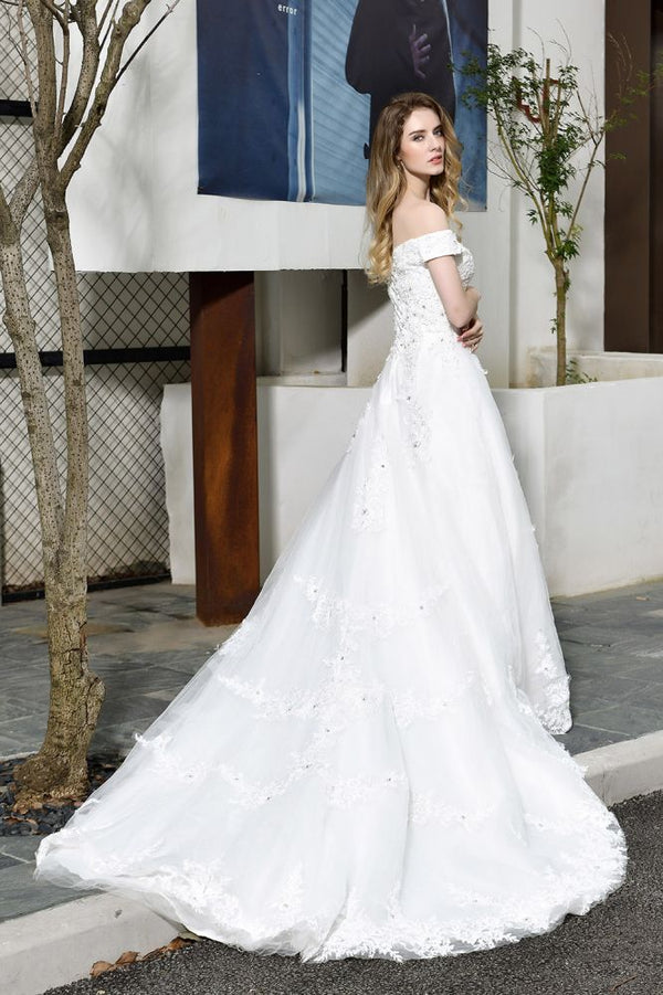 Looking for a perfect dress for your big day. stylesnuggle has Classic White Lace Off-the-Shoulder Wedding Dress avilable in White, Ivroy and champange. Try this simple bridal gowns for your summer wedding.