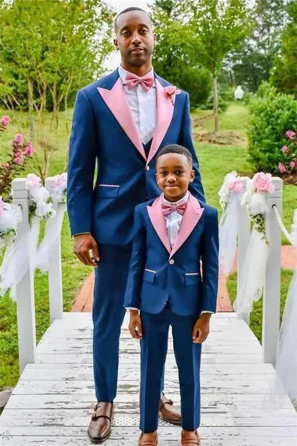 Discover the very best Dark Blue One Button Wedding Groom Suit with Pink Lapel for work,prom and wedding occasions at stylesnuggle. Made Dark Blue Peaked Lapel Mens Suits with high Quality.