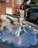 Looking for Prom Dresses, Evening Dresses in Mermaid style,  and Gorgeous Appliques work? stylesnuggle has all covered on this elegant Deep V-neck Sleeveless Appliques Court Train Mermaid Prom Dresses.