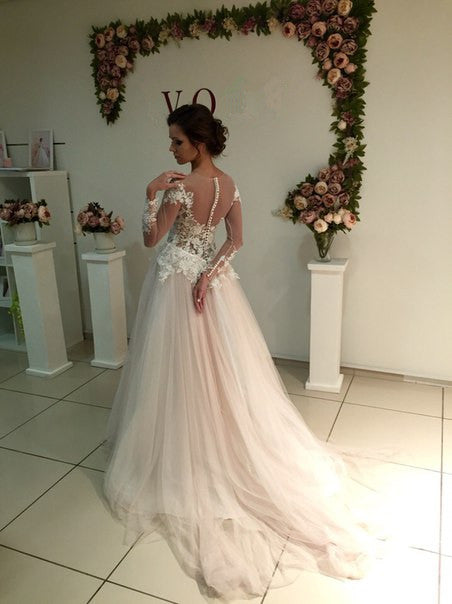 stylesnuggle offers Delicate Lace Appliques Tulle Long-Sleeve A-line Sweep-Train Bridal Dress at factory price ,all made in high quality, fast delivery worldwide.