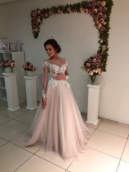 stylesnuggle offers Delicate Lace Appliques Tulle Long-Sleeve A-line Sweep-Train Bridal Dress at factory price ,all made in high quality, fast delivery worldwide.