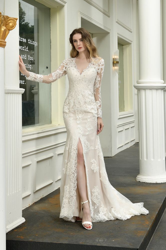 Searching for a perfect wedding dress for your big day. stylesnuggle has Delicate V-Neck High Split Long Sleevess Lace Wedding Dress avilable in White, Ivroy and champange. Try this simple bridal gowns for your summer wedding.