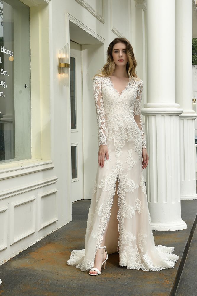 Searching for a perfect wedding dress for your big day. stylesnuggle has Delicate V-Neck High Split Long Sleevess Lace Wedding Dress avilable in White, Ivroy and champange. Try this simple bridal gowns for your summer wedding.