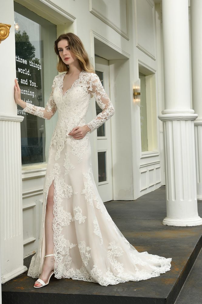 Searching for a perfect wedding dress for your big day. stylesnuggle has Delicate V-Neck High Split Long Sleevess Lace Wedding Dress avilable in White, Ivroy and champange. Try this simple bridal gowns for your summer wedding.