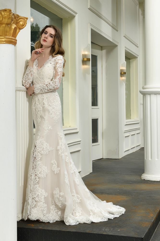 Searching for a perfect wedding dress for your big day. stylesnuggle has Delicate V-Neck High Split Long Sleevess Lace Wedding Dress avilable in White, Ivroy and champange. Try this simple bridal gowns for your summer wedding.