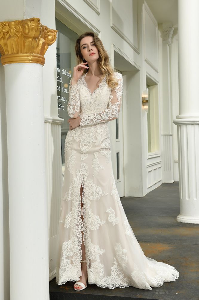 Searching for a perfect wedding dress for your big day. stylesnuggle has Delicate V-Neck High Split Long Sleevess Lace Wedding Dress avilable in White, Ivroy and champange. Try this simple bridal gowns for your summer wedding.