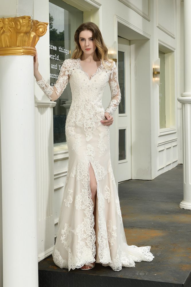 Searching for a perfect wedding dress for your big day. stylesnuggle has Delicate V-Neck High Split Long Sleevess Lace Wedding Dress avilable in White, Ivroy and champange. Try this simple bridal gowns for your summer wedding.