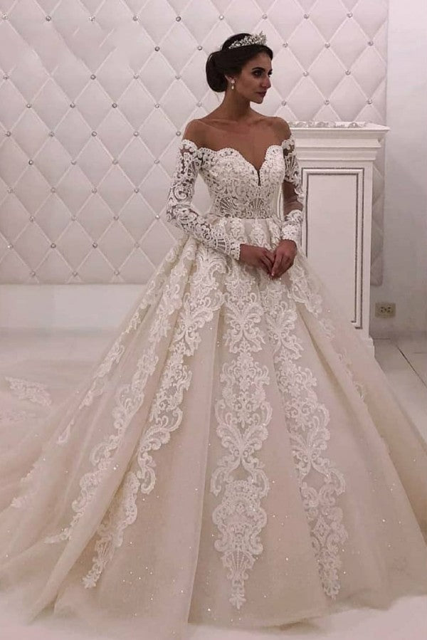 Searching for a dress in lace, A-line style, and delicate Lace,Pearls work? We meet all your need with this Classic Designer Off-theshoulder Lace Princess White wedding dress at factory price.