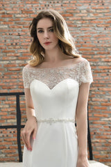 Wanna get a perfect dress for your big day. stylesnuggle has Cap Sleeve Mermaid Lace Ivory Wedding Dress avilable in White, Ivroy and champange. Try this simple bridal gowns for your summer wedding.