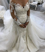 stylesnuggle offers Glamorous Long Sleeves Lace Tulle Wedding Dresses latest Ruffless Mermaid Bridal Gowns at a good price ,all made in high quality. All sold at reasonable price 