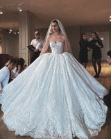 Inspired by this wedding dress at stylesnuggle.com,Ball Gown style, and Amazing Lace,Appliques work? We meet all your need with this Classic Glamorous Modern Strapless Lace Appliques Ball Gown Wedding Dress.