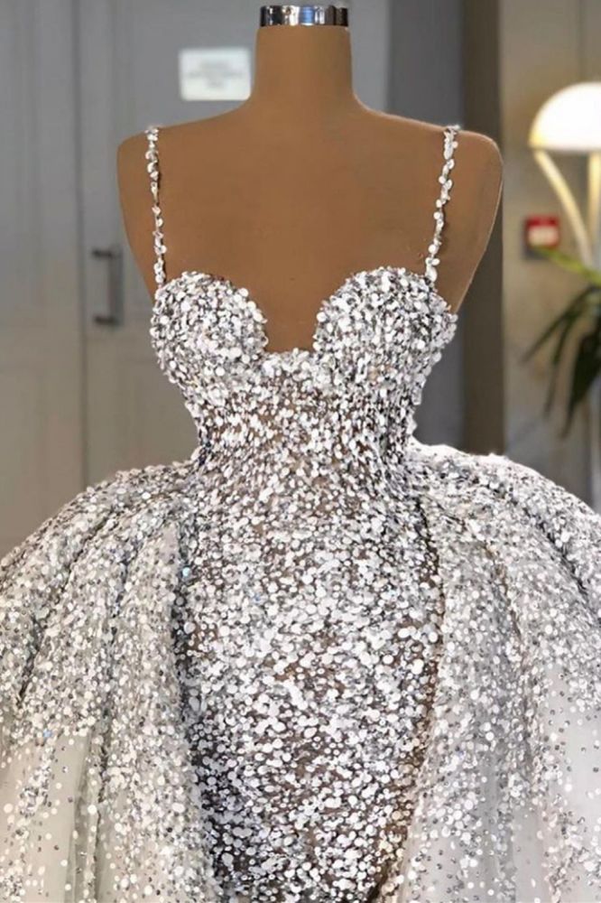 Looking for a dress in Tulle, Mermaid style, and AmazingSequined work? We meet all your need with this Classic Glitter Mermaid Ball Gown Spaghetti Sequins Tulle party Gown.