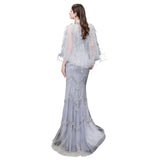 Looking for Prom Dresses, Evening Dresses, Homecoming Dresses, Quinceanera dresses in Tulle,  Mermaid style,  and Gorgeous Beading, Crystal, Feathers, Sequined, Rhinestone,  work? stylesnuggle has all covered on this elegant Gorgeous Silver Feather Cape Mermaid Sparkle Prom Dress.