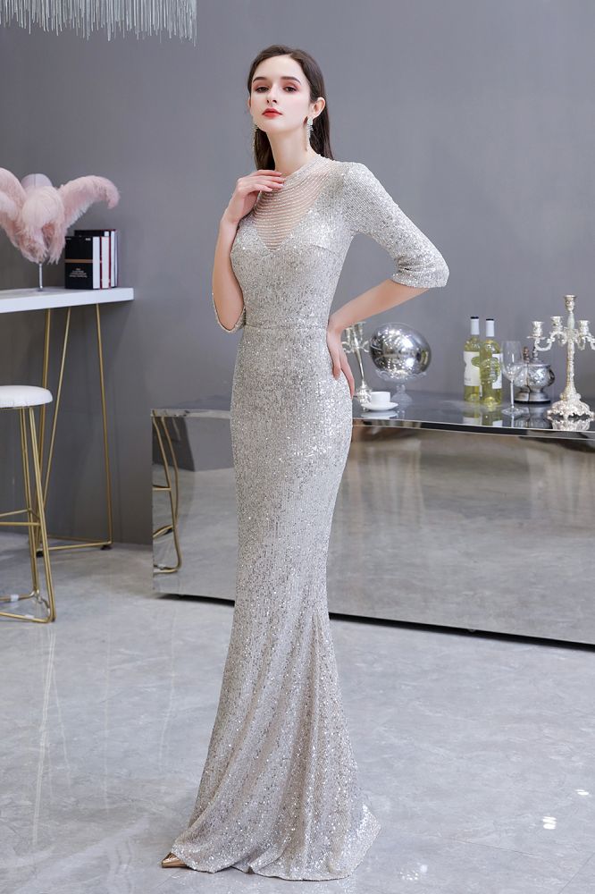 Looking for Prom Dresses, Evening Dresses, Homecoming Dresses, Quinceanera dresses in Tulle, Sequined,  Mermaid style,  and Gorgeous Beading, Buttons, Sequined work? stylesnuggle has all covered on this elegant Gorgeous Silver Long Sleevess Long Prom Dress.