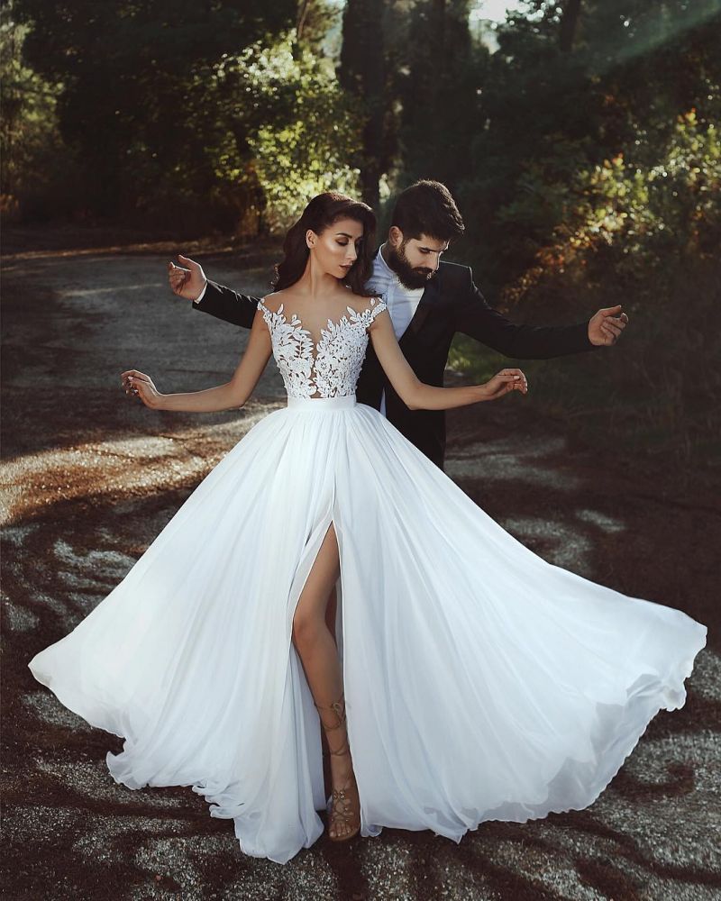 stylesnuggle custom made this lace Modern wedding dressat reasonable price, we sell dresses online all over the world. Also, extra discount are offered to our customs. We will try our best to satisfy everyoneone and make the dress fit you w