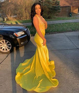 Looking for Prom Dresses in Stretch Satin,  Mermaid style,  and Gorgeous work? stylesnuggle has all covered on this elegant Latest V-neck Halter Appliques Brush Train Mermaid Prom Dresses.