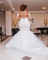 Inspired by this wedding dress at stylesnuggle.com,Mermaid style, and Amazing Appliques work? We meet all your need with this Classic Long Sleeves Appliques Sheer Tulle Mermaid Lace Wedding Dresses Bridal Gowns.