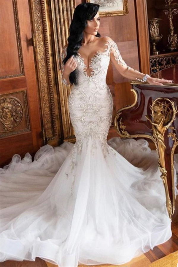 stylesnuggle.com supplies you Long Sleeves V-neck Mermaid Court train Summer Wedding Dress at a price from Tulle to Mermaid hem. Fast delivery worldwide. 