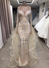 Shop for Luxurious Long Sleeves off-the-shoulder Prom Party Gowns with fully-covered beads at best prices. stylesnuggle has the best handmade details for fully beaded prom dresses online.