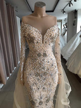 Shop for Luxurious Long Sleeves off-the-shoulder Prom Party Gowns with fully-covered beads at best prices. stylesnuggle has the best handmade details for fully beaded prom dresses online.