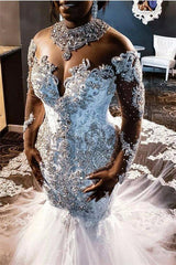 stylesnuggle offers Luxurious Long Sleevess Beading Appliques Rhinestones Mermaid Wedding Dress with Sweep Train at a good price ,all made in high quality. All sold at reasonable price