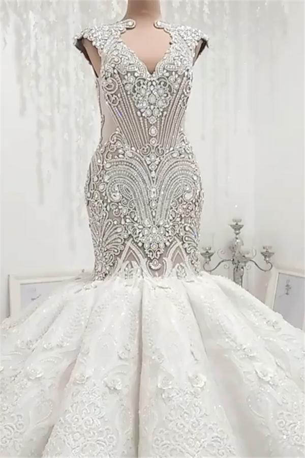 stylesnuggle offers Luxurious Sleeveless Appliques Mermaid Wedding Bridal Gowns at a good price ,all made in high quality, Fast delivery worldwide.. 