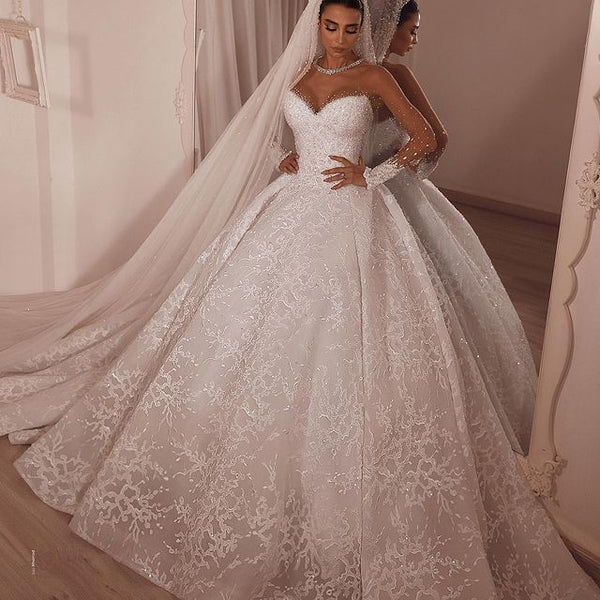 stylesnuggle.com supplies you Luxurious Sparkle Beaded Ball Gown Tulle Lace Illusion neck Wedding Dress online at an affordable price, 1000+ options to choose from.