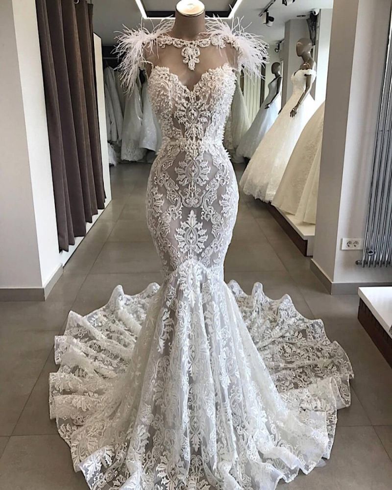 stylesnuggle.com supplies you Luxurious White Sweetheart Open Back Lace Long Wedding Dress with Fur at factory price. Fast delivery worldwide.