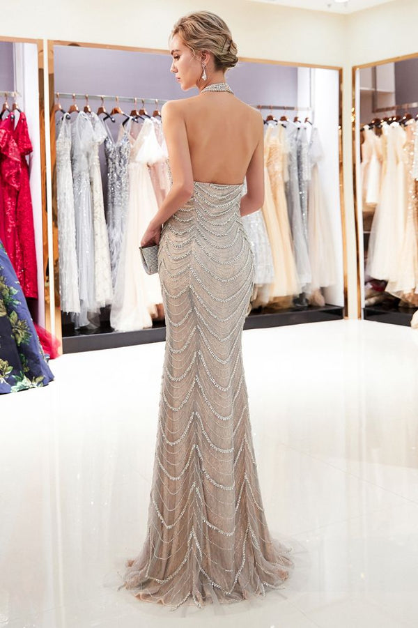 Looking for Prom Dresses, Evening Dresses in Tulle,  Mermaid style,  and Gorgeous Pattern, Sequined work? stylesnuggle has all covered on this elegant MAURA Mermaid Halter Sleeveless Long Sequined Pattern Evening Dresses.