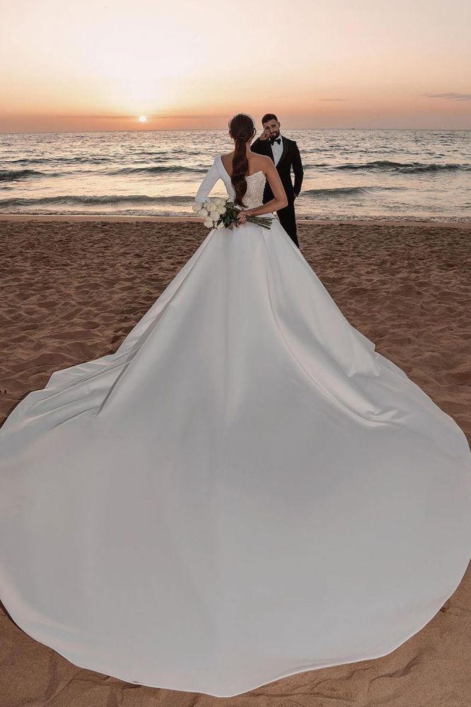 stylesnuggle offers Modern One Shoulder Ruffles Satin Sparkly Seqiuns Mermaid Bridal Dress with Sweep Court Train at a good price, 1000+ options, fast delivery worldwide.