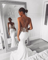 Inspired by this wedding dress at stylesnuggle.com,Mermaid style, and Amazing Lace work? We meet all your need with this Classic Modern V-Neck Lace Spaghetti Strap Mermaid Wedding Dress Open Back Bridal Gown.