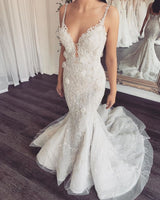 Looking for a dress in Lace, Mermaid style, and Amazing Lace work? stylesnuggle custom made you this Modern V-neck Sleeveless Lace Overskirt Bridal Gowns For Wedding latest.