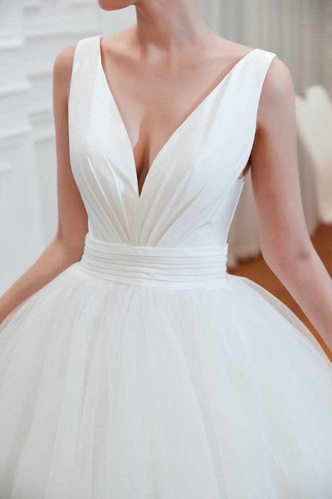 Try this Modern V-neck sleeveless White Princess Spring Wedding Dress to wow your wedding guests with stylesnuggle. Extra coupons to save a lot.