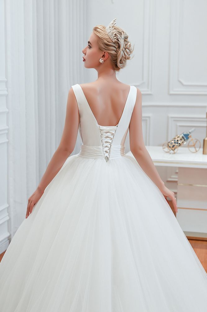 Try this Modern V-neck sleeveless White Princess Spring Wedding Dress to wow your wedding guests with stylesnuggle. Extra coupons to save a lot.