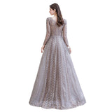 Looking for Prom Dresses, Evening Dresses, Homecoming Dresses, Quinceanera dresses in Tulle, Lace,  A-line style,  and Gorgeous Draped, Pearls, Sequined, Rhinestone work? stylesnuggle has all covered on this elegant Modest Long Sleevess V-neck Princess Prom Dress.