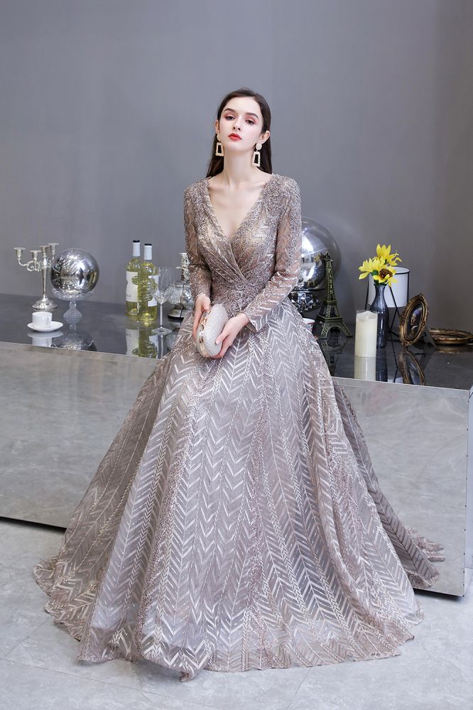 Looking for Prom Dresses, Evening Dresses, Homecoming Dresses, Quinceanera dresses in Tulle, Lace,  A-line style,  and Gorgeous Draped, Pearls, Sequined, Rhinestone work? stylesnuggle has all covered on this elegant Modest Long Sleevess V-neck Princess Prom Dress.