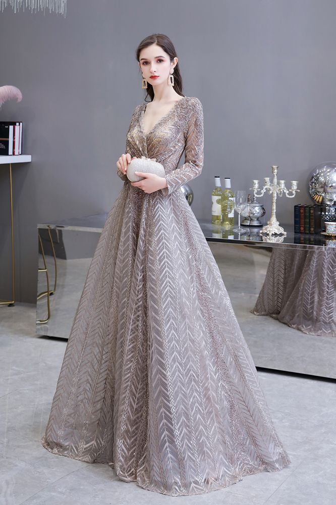 Looking for Prom Dresses, Evening Dresses, Homecoming Dresses, Quinceanera dresses in Tulle, Lace,  A-line style,  and Gorgeous Draped, Pearls, Sequined, Rhinestone work? stylesnuggle has all covered on this elegant Modest Long Sleevess V-neck Princess Prom Dress.