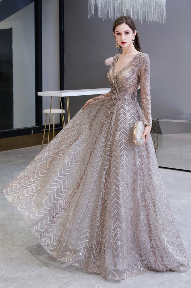 Looking for Prom Dresses, Evening Dresses, Homecoming Dresses, Quinceanera dresses in Tulle, Lace,  A-line style,  and Gorgeous Draped, Pearls, Sequined, Rhinestone work? stylesnuggle has all covered on this elegant Modest Long Sleevess V-neck Princess Prom Dress.